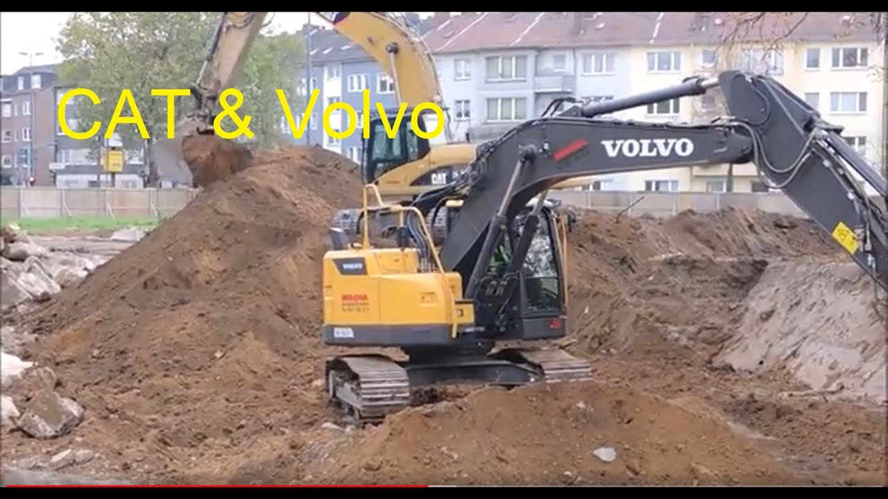 Excavator CAT 330 D and Volvo ECR 235 - demolition site
