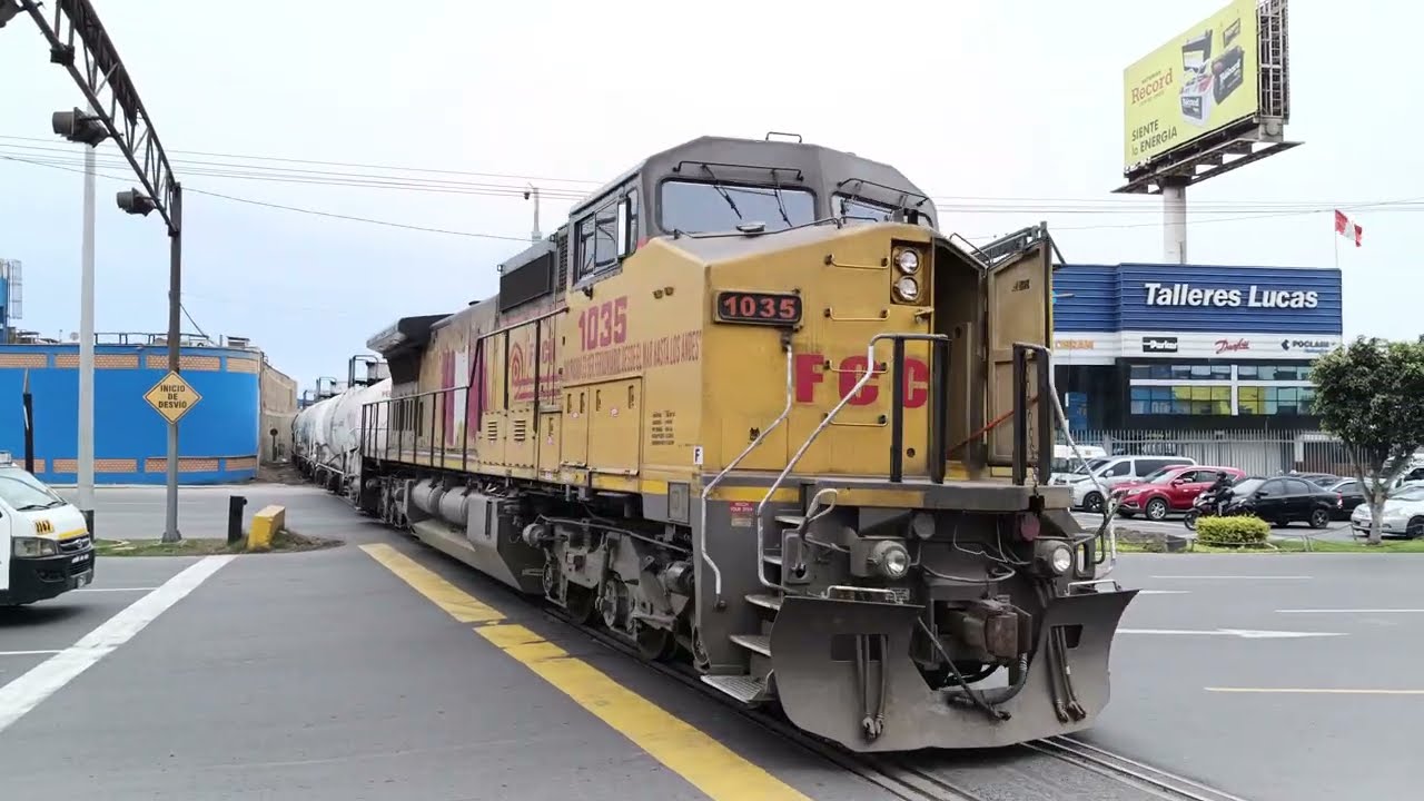 GE C41-8W #1035 & Nippon Sharyo Ex CALTRAIN JT26W-2B #702.