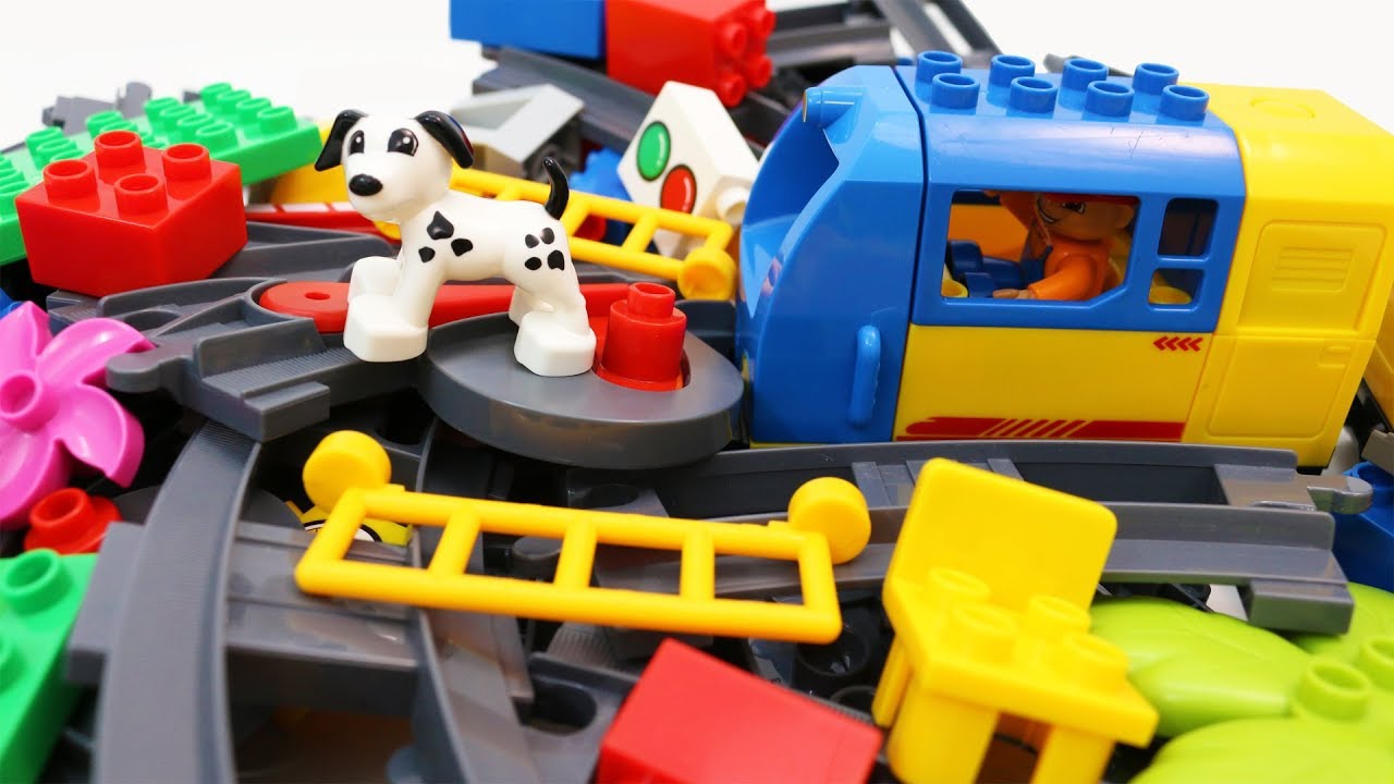 Building Blocks Toy Train and a Dog