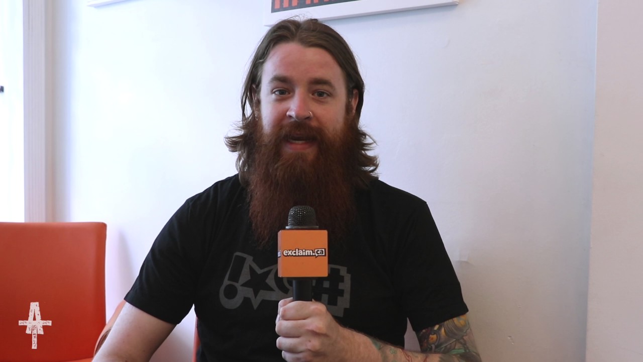 Integrity vocalist Dwid Hellion explains why 'Systems Overload' got remixed | Aggressive Tendencies