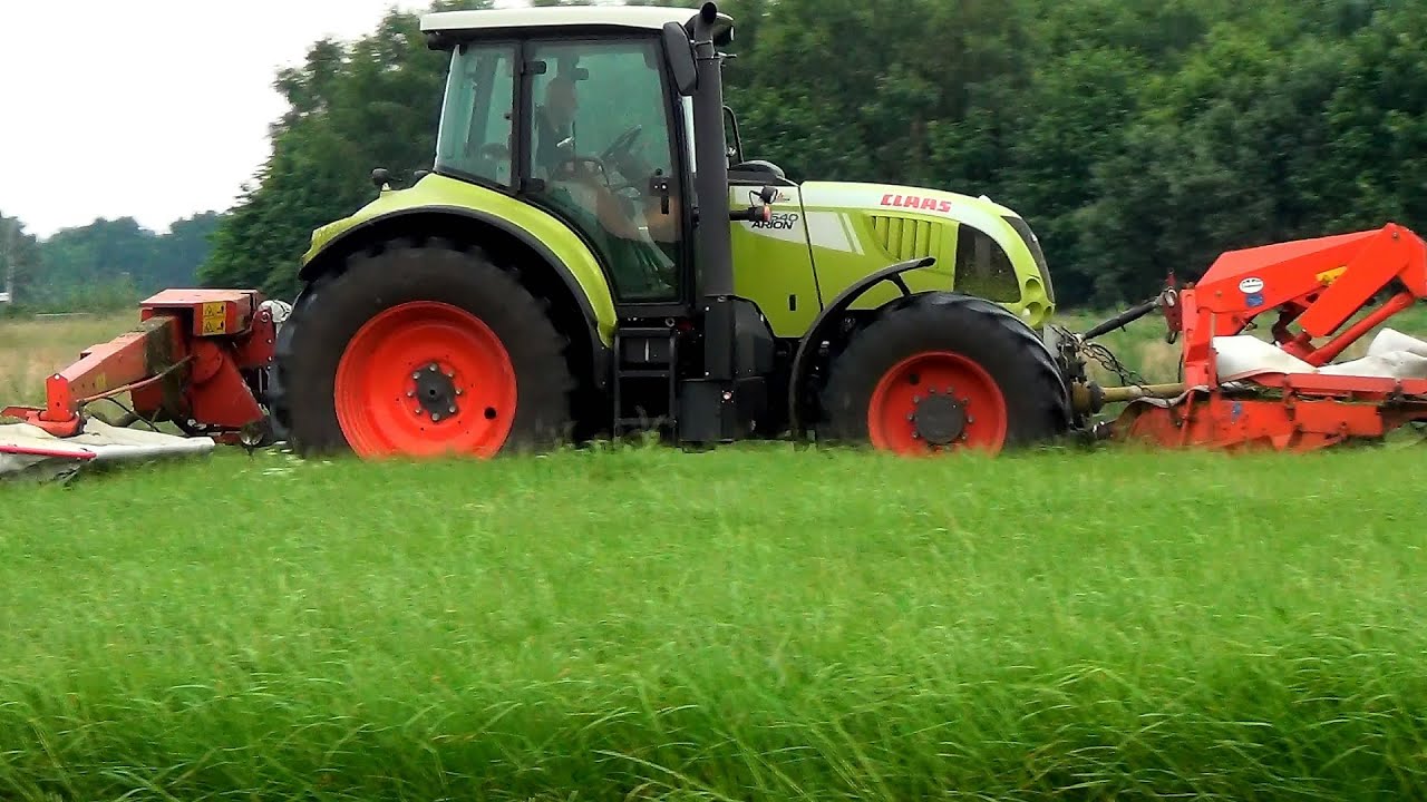 Claas Arion 640 met Kuhn FC313 maaiers