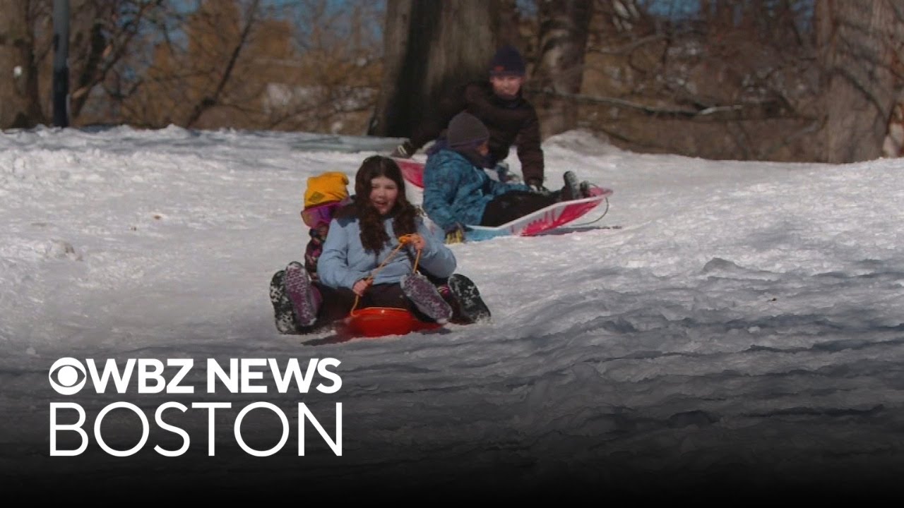 Kids with snow days after school vacation week enjoy sledding on Boston Common