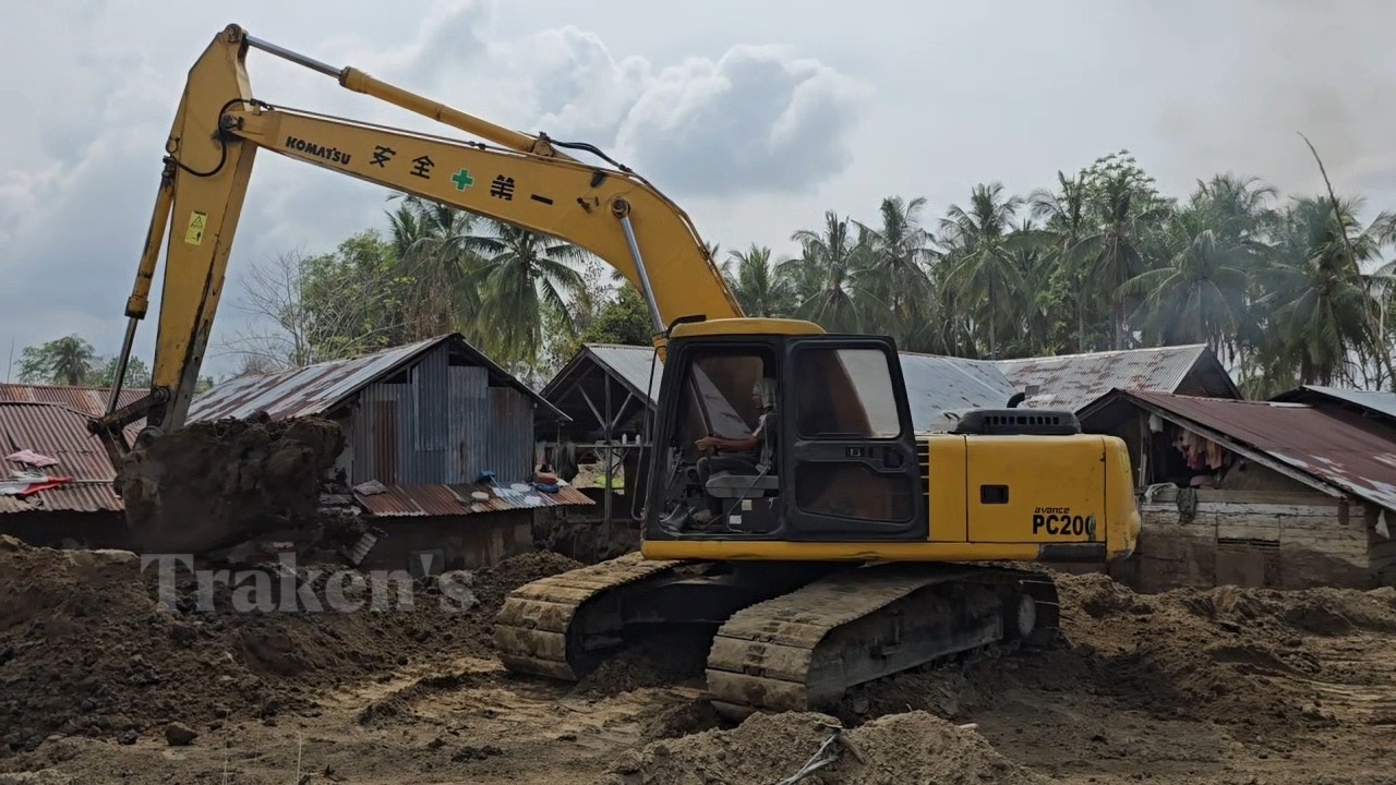 Hitachi Excavator Komatsu PC200 Bulldozer and Dump Trucks Clearing and Landscaping River embankment.