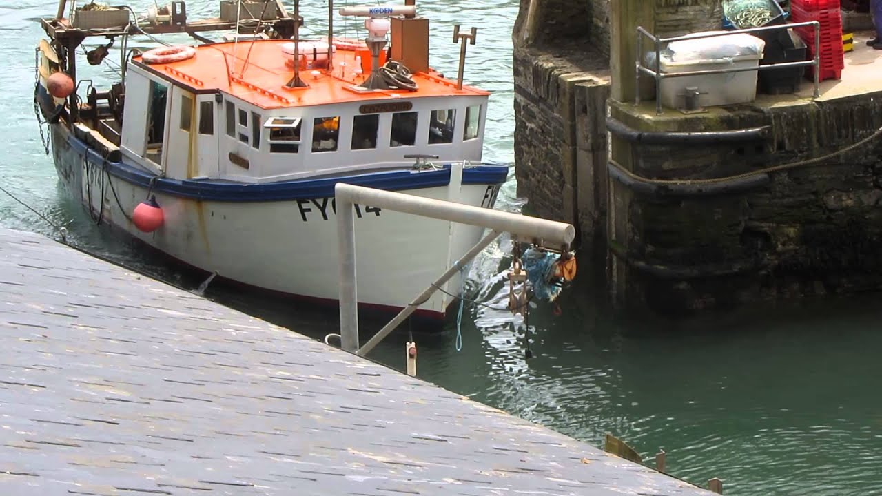 Fishing boat arriving at Polperro