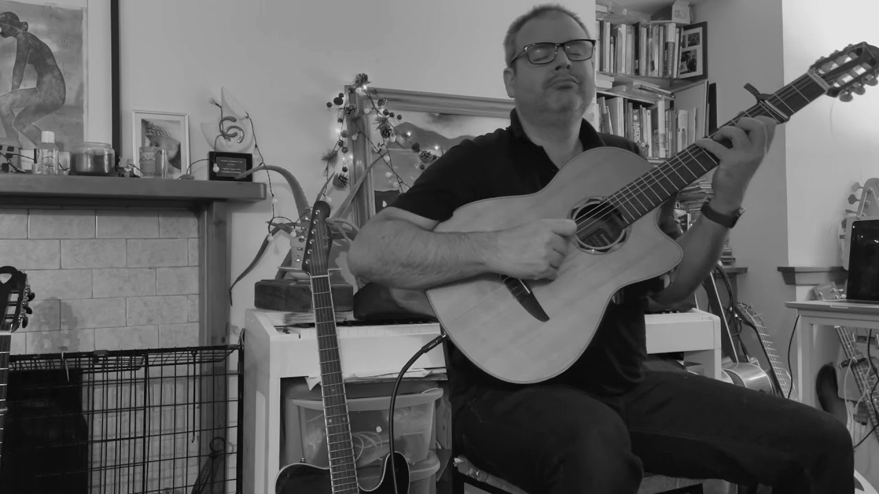 Celtic music on guitar - Tim Edey plays out on the ocean