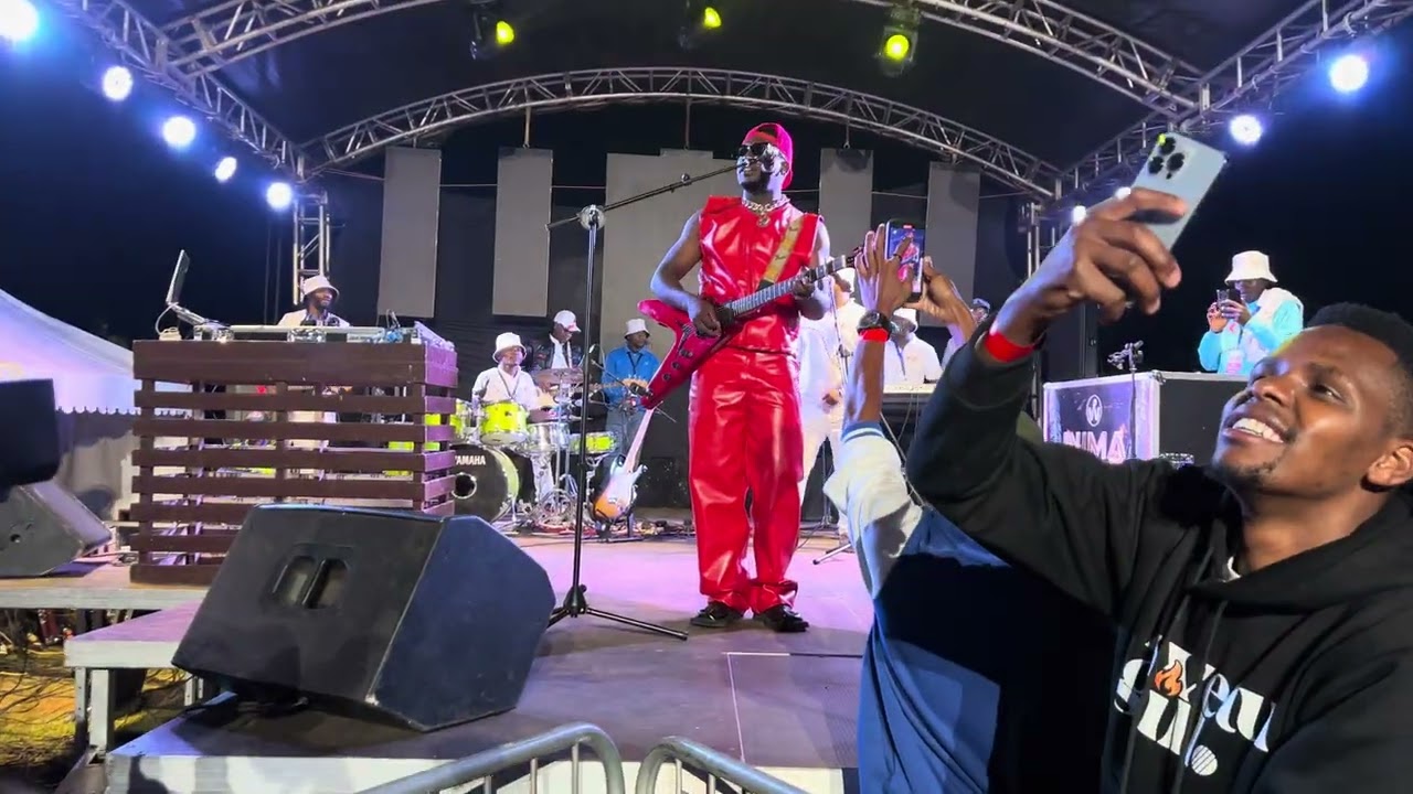 Muthoni wa Kirumba inviting @Waithaka_wa_Jane  on the stage at K fest