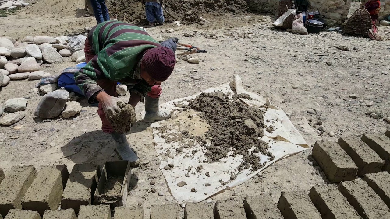 Tanpo Solar School mud brick laying