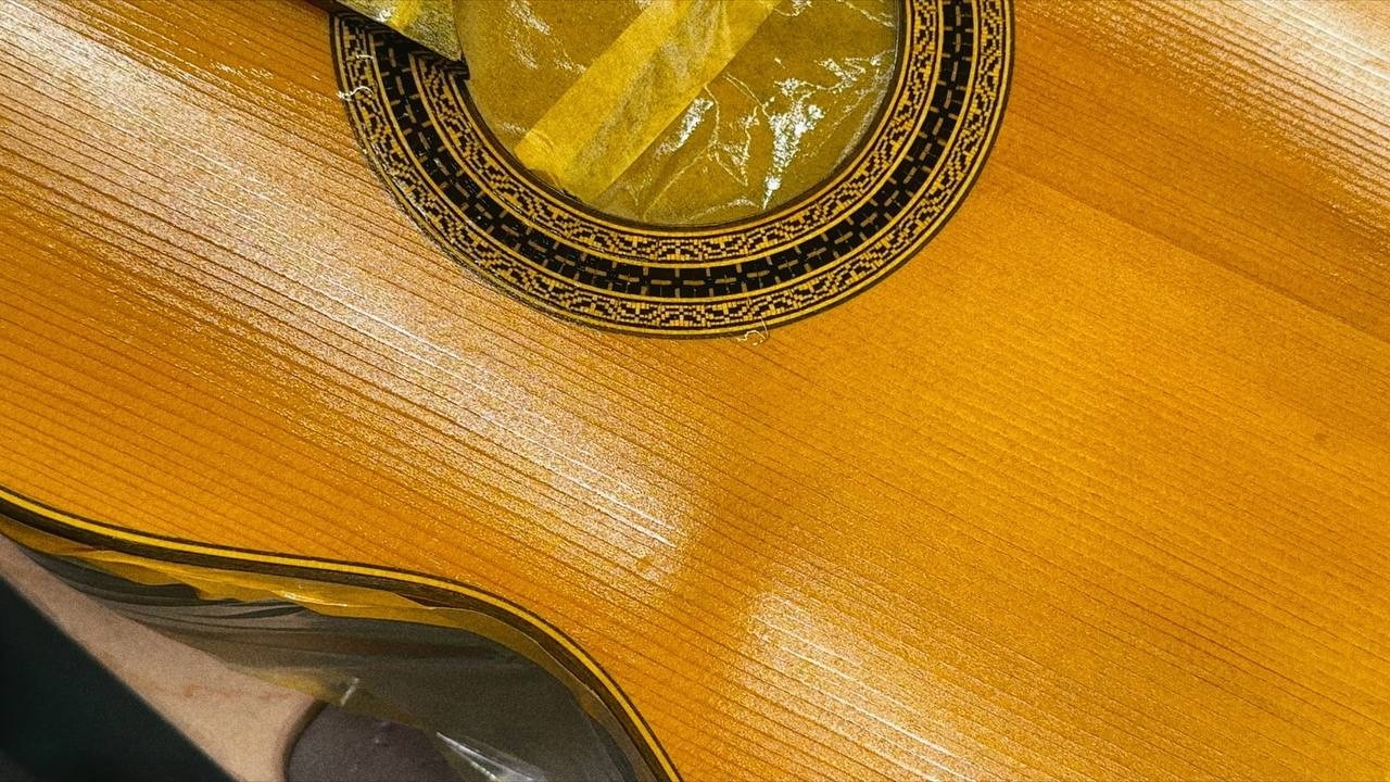 This Is How a Guitar Top Is Refinished