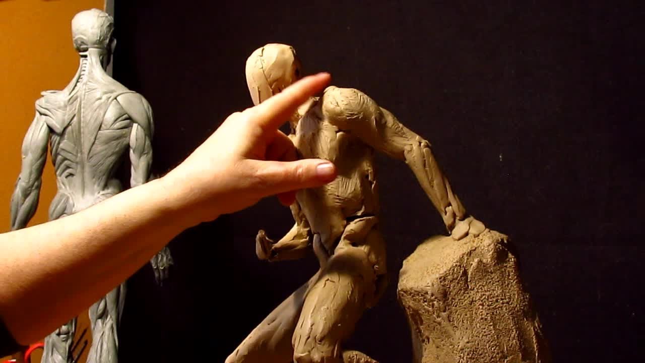 Removing the Armature's Support and Working on the Left Arm