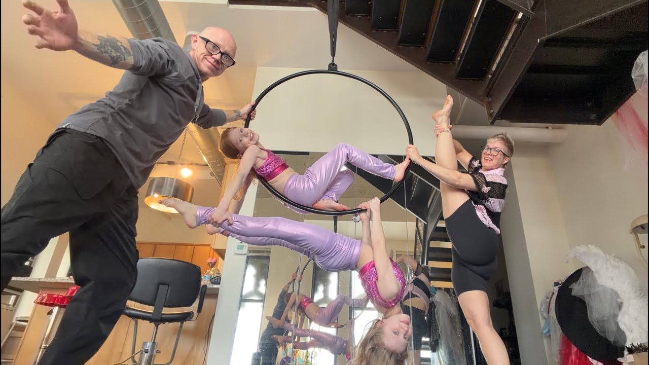 We do Lyra hoop circus family tricks!!!