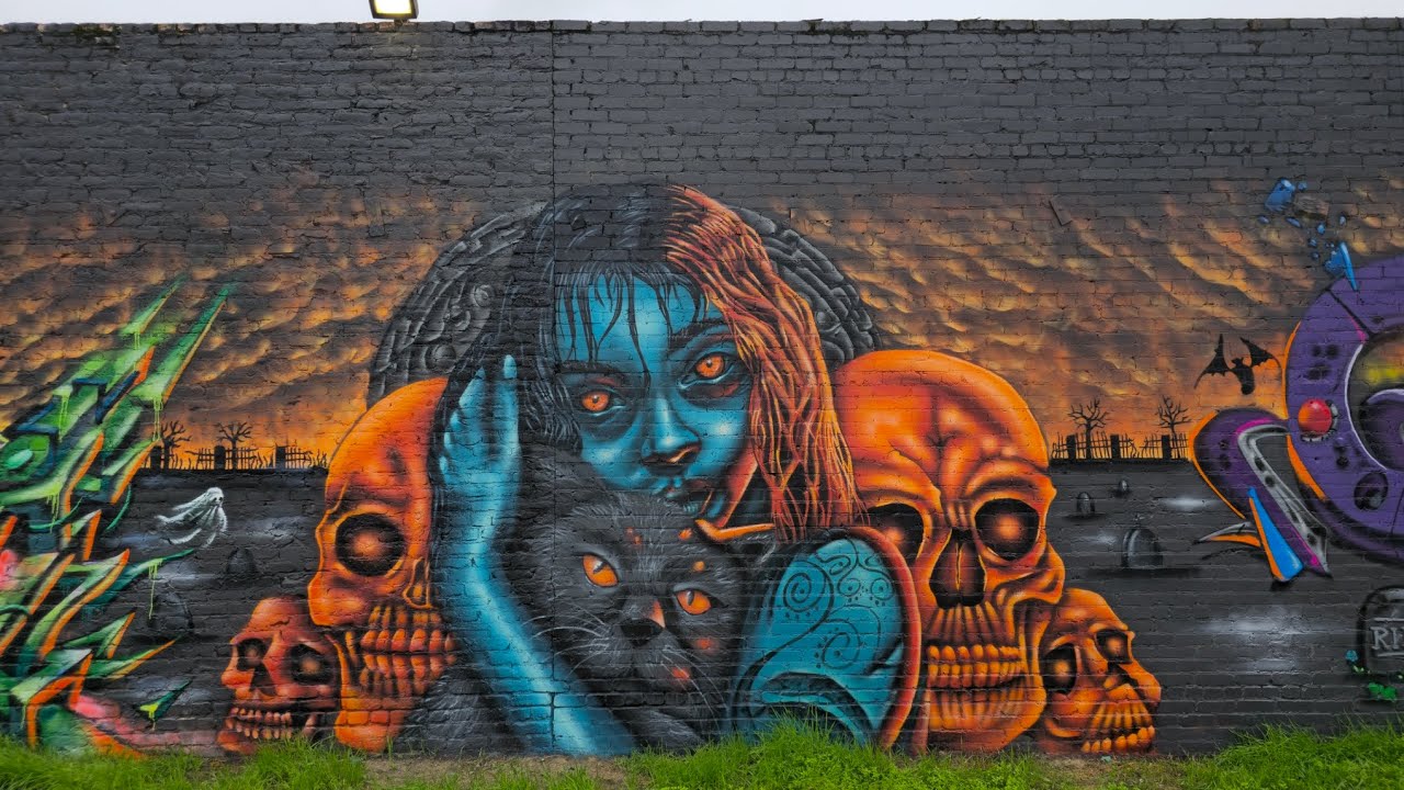 GRAFF ON WALLS AND FREIGHT CARS