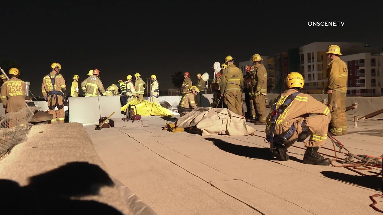 Firefighters Rescue Woman From Confined Space | Los Angeles