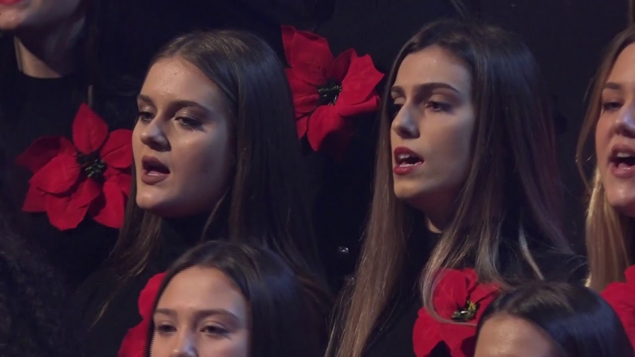 School chorus performs Happy New Year, Someone You Loved and Freedom