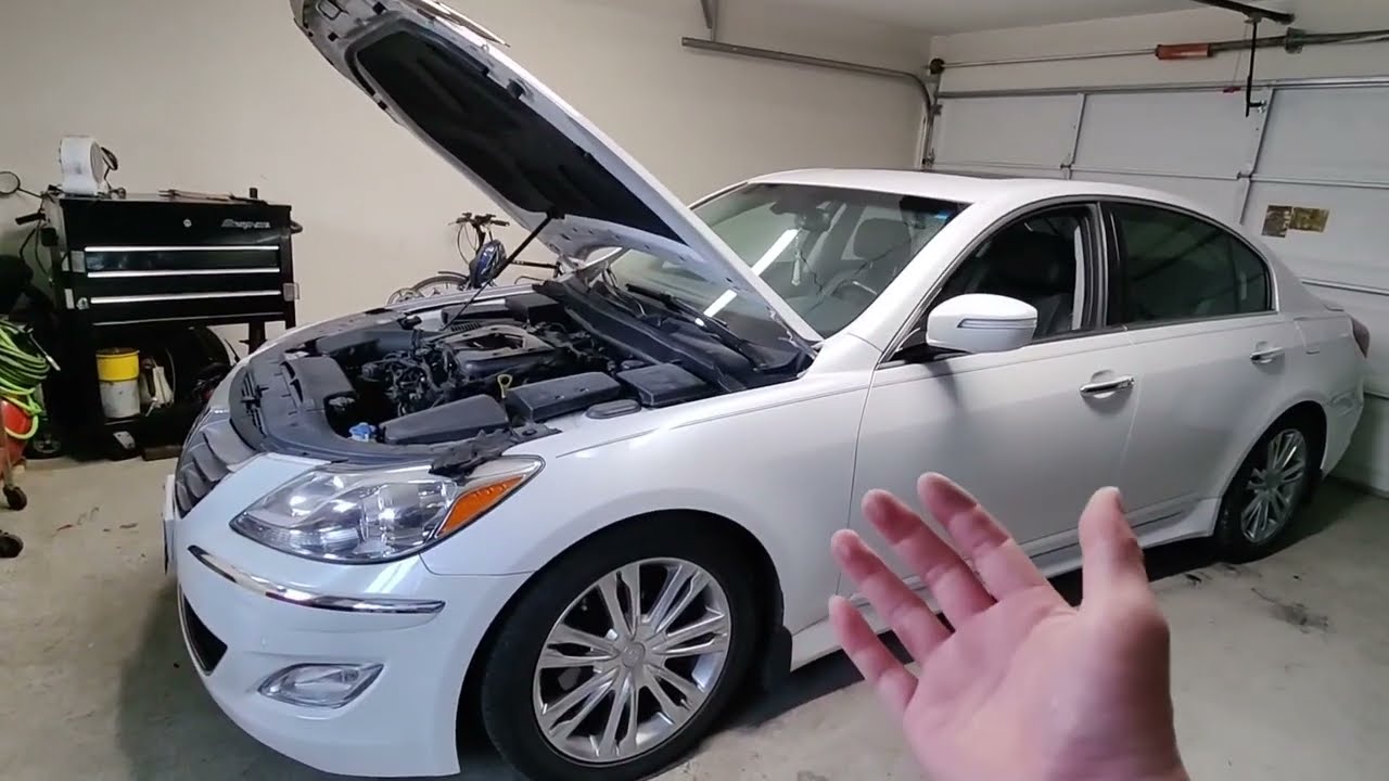 This is why she is dating me. Changing the oil on her 2012 Hyundai Genesis.