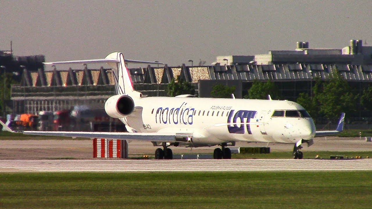 Nordica (LOT) CRJ900 (ES-ACI) landing+taxi+take off at Munich Airport!