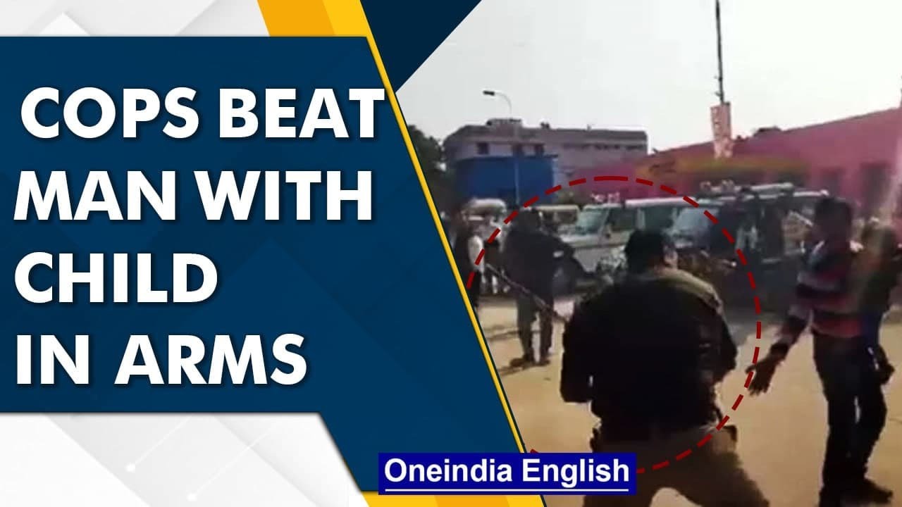 UP: Cops thrash man carrying child, police admits 'insensitivity' | Oneindia News
