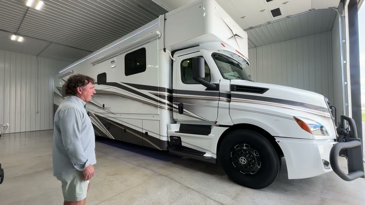 2026 45ft Showhauler with Custom Paint offers quad slides as well as a bath and a half