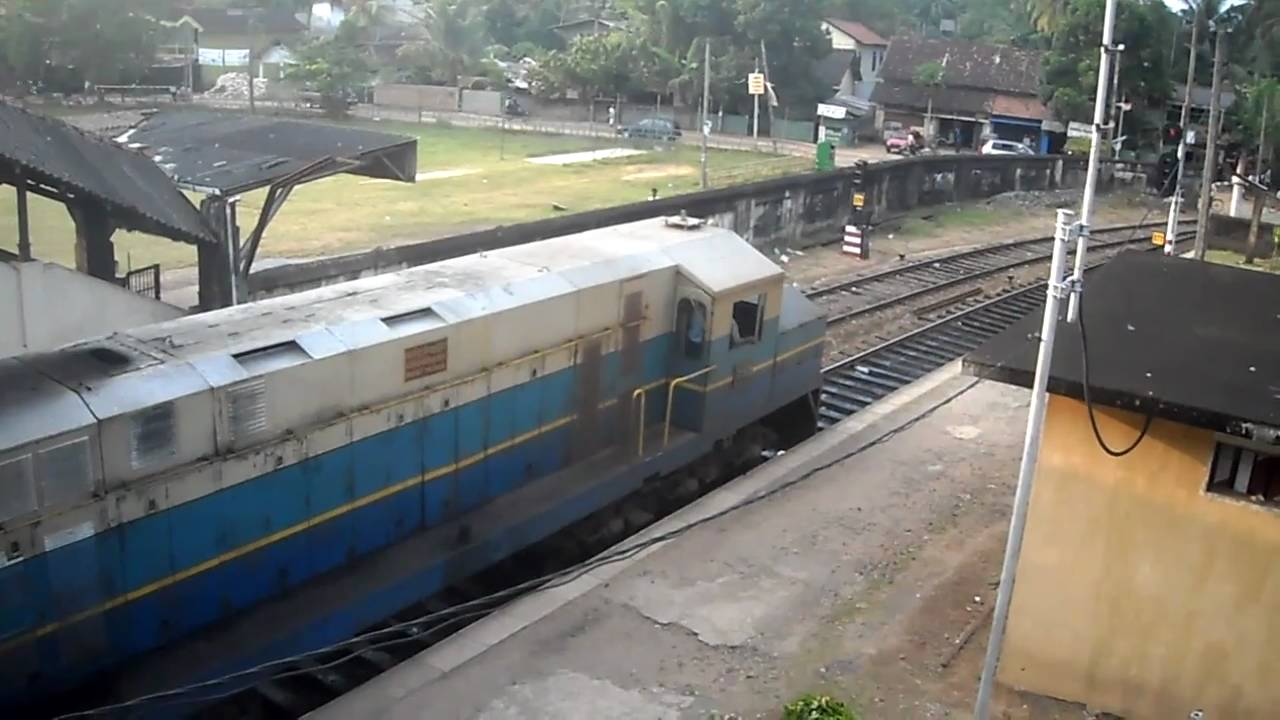 Class M4 :Diesel Electric Locomotive clagging out of Aluthgama Station