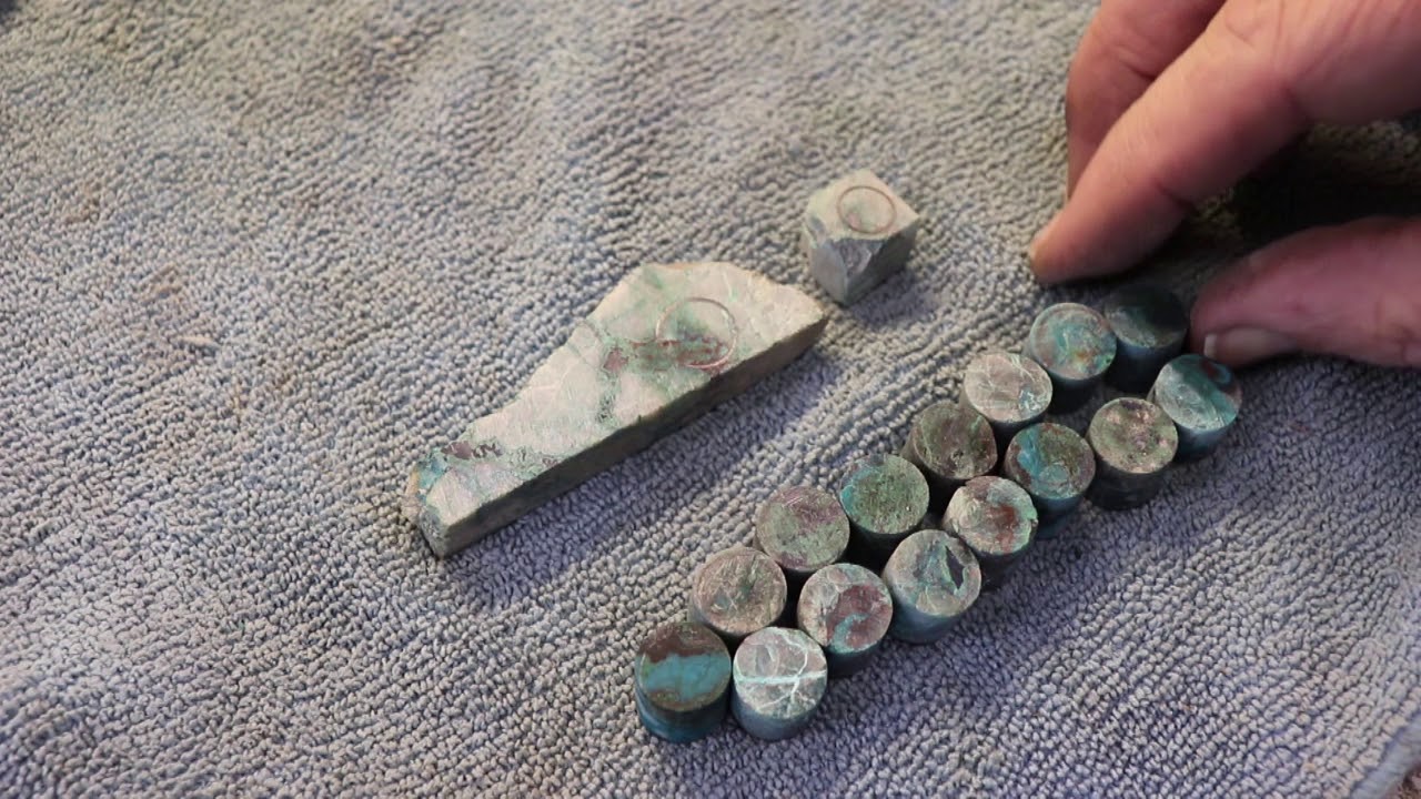 Lapidary cutting of plugs or gage from slab to finish plug out of Malachite and Chrysocolla