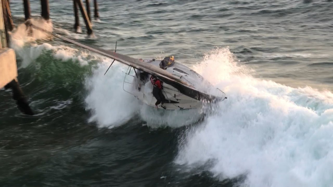 Sailboat Capsized into Redondo Beach Pier in California