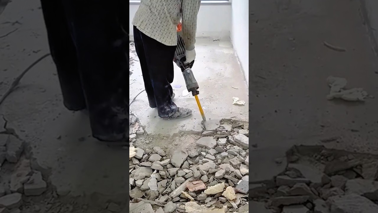 Breaking Hardened Concrete Using a Powerful Electric Jackhammer with Controlled Force #shorts