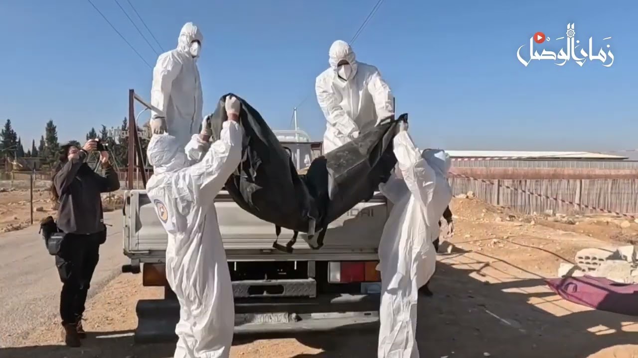 مقبرة جماعية وكتابة باللغة الفارسية في سوريا