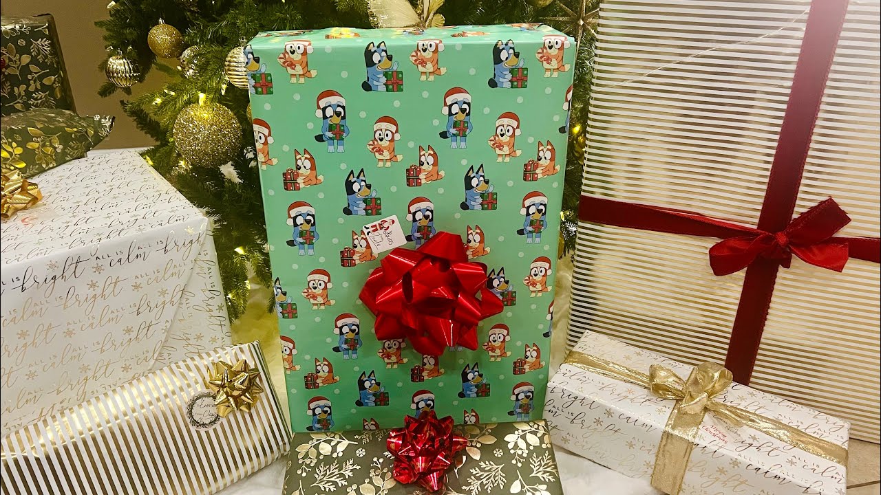 Bluey, Master Chief, Ps5 Portal unwrapping Christmas Gifts