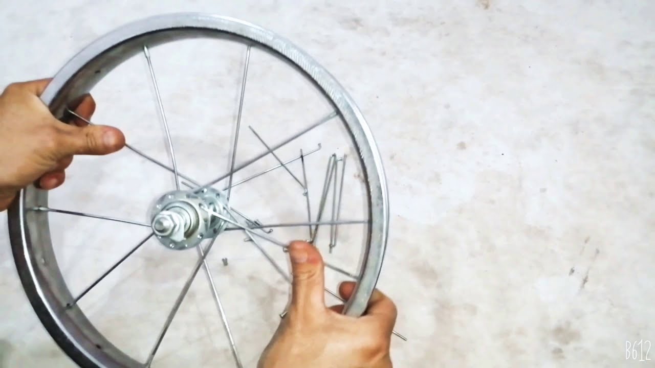 كيفية تركيب سلك طارة عجلة اطفال