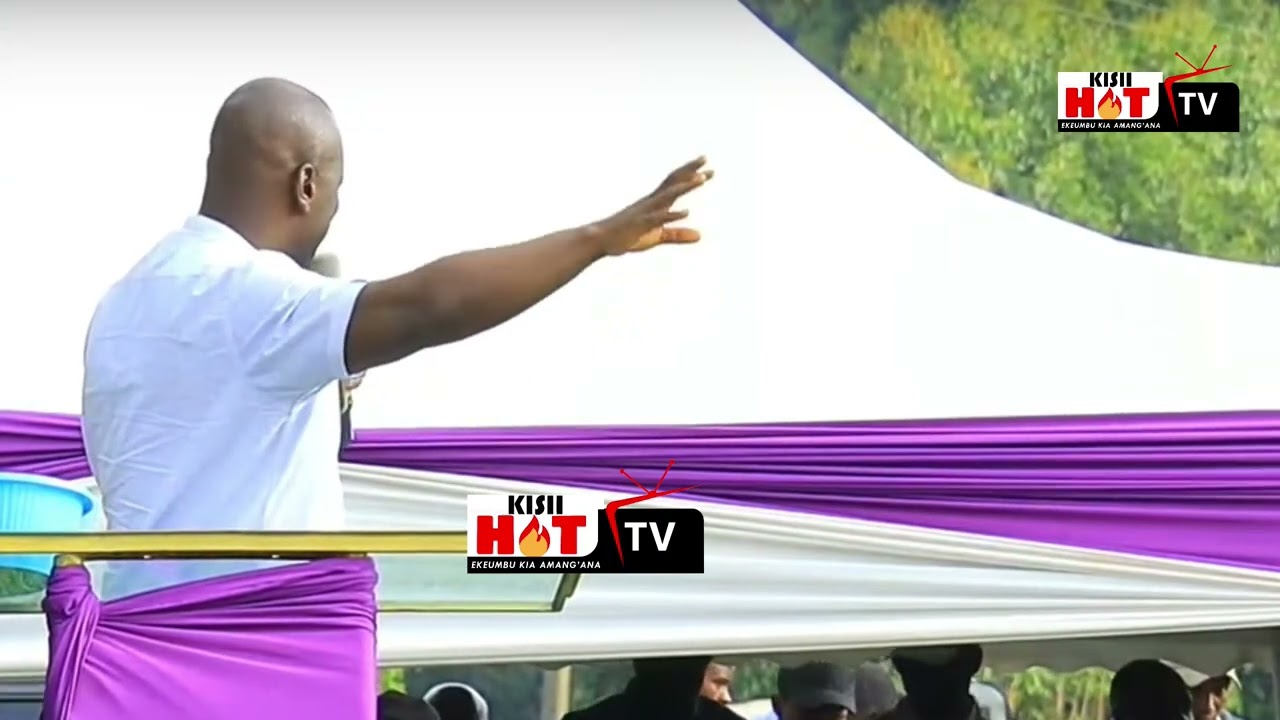 Brave Hon Kibagendi controls angry crowd from attacking Hon Doris Donya Aburi.