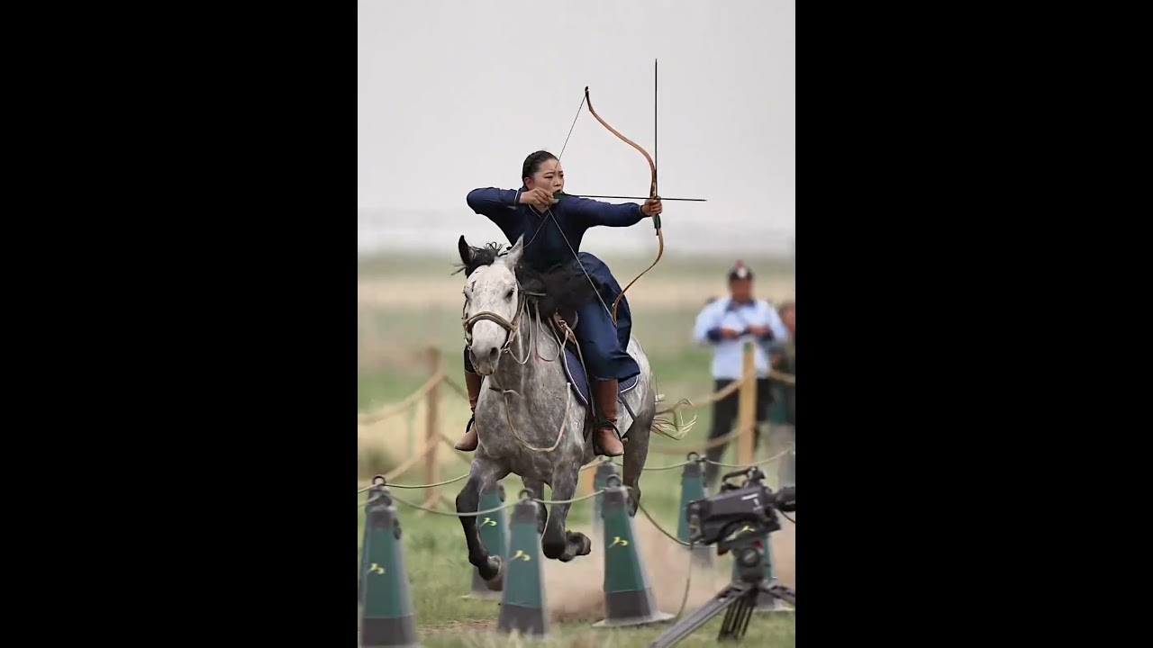 Mongolian Girl riding a horse and shooting arrows #archery #horse #horseriding
