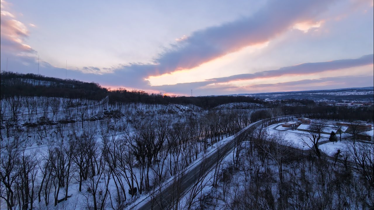 Relaxing snowy view of Lewistown with trains and heavy equipment by drone #drone #train #snow 