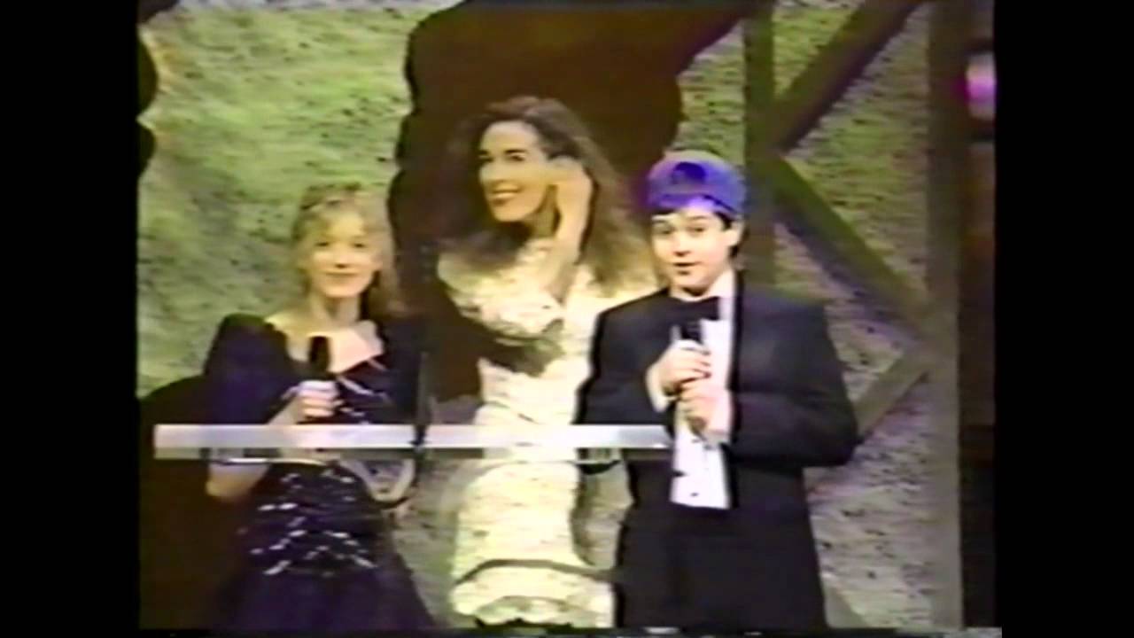 Sarah Polley, Mag Ruffman, and Zachary Bennett present an award
