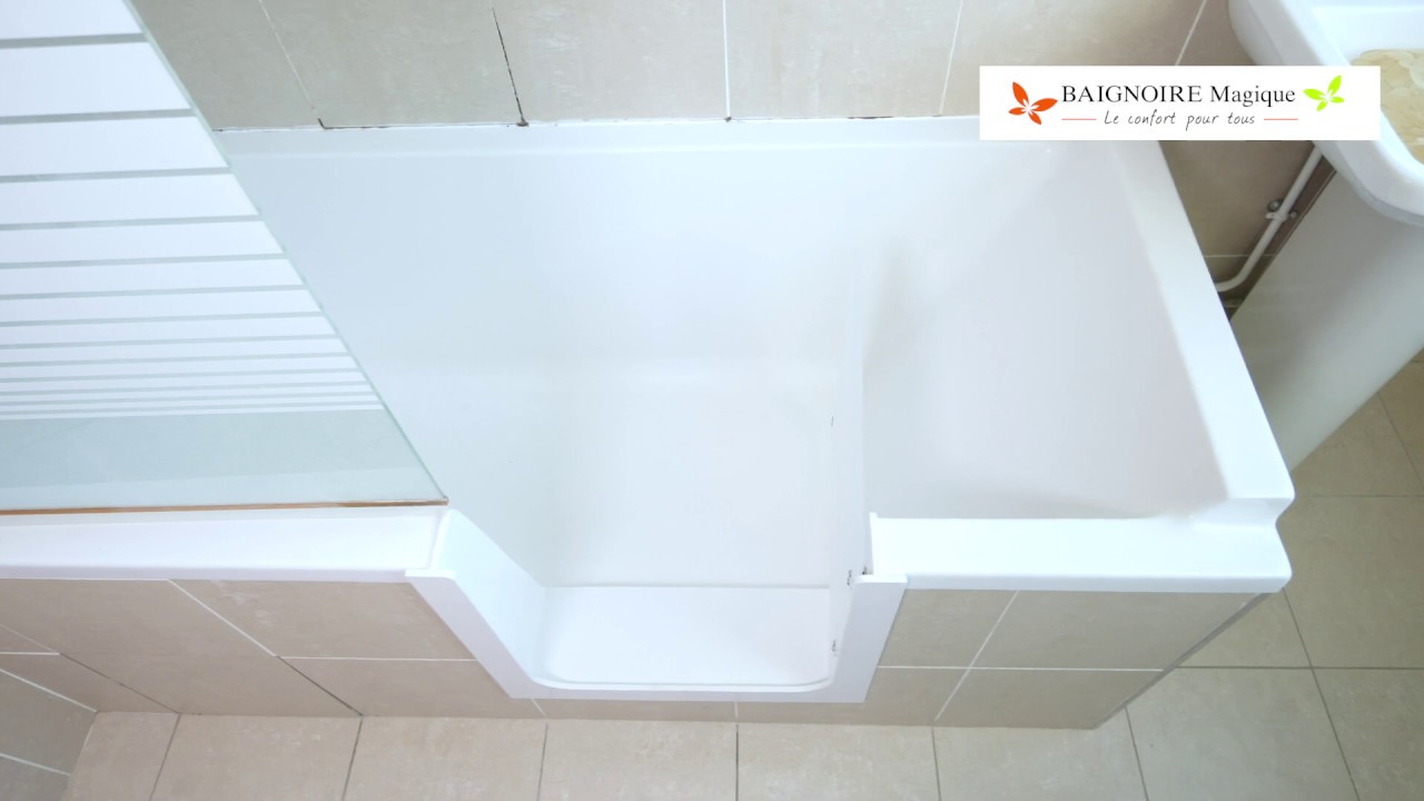 Installation d'une porte dans la baignoire de Catherine à Paris (75)