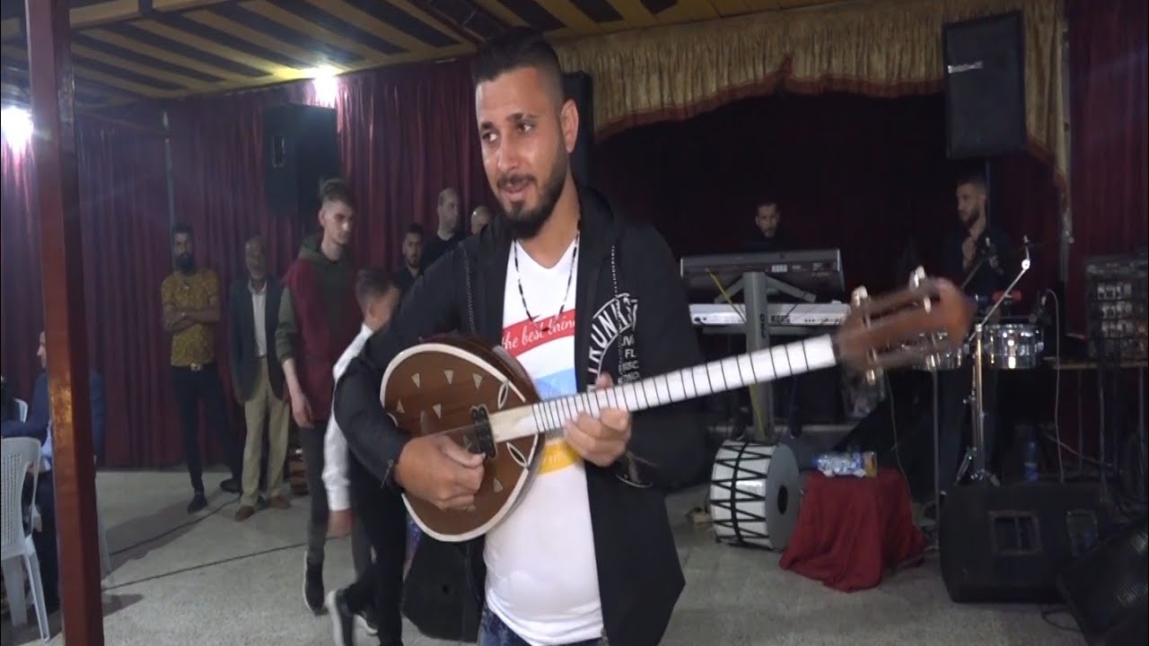 عازف البزق الفنان نجم اسبر