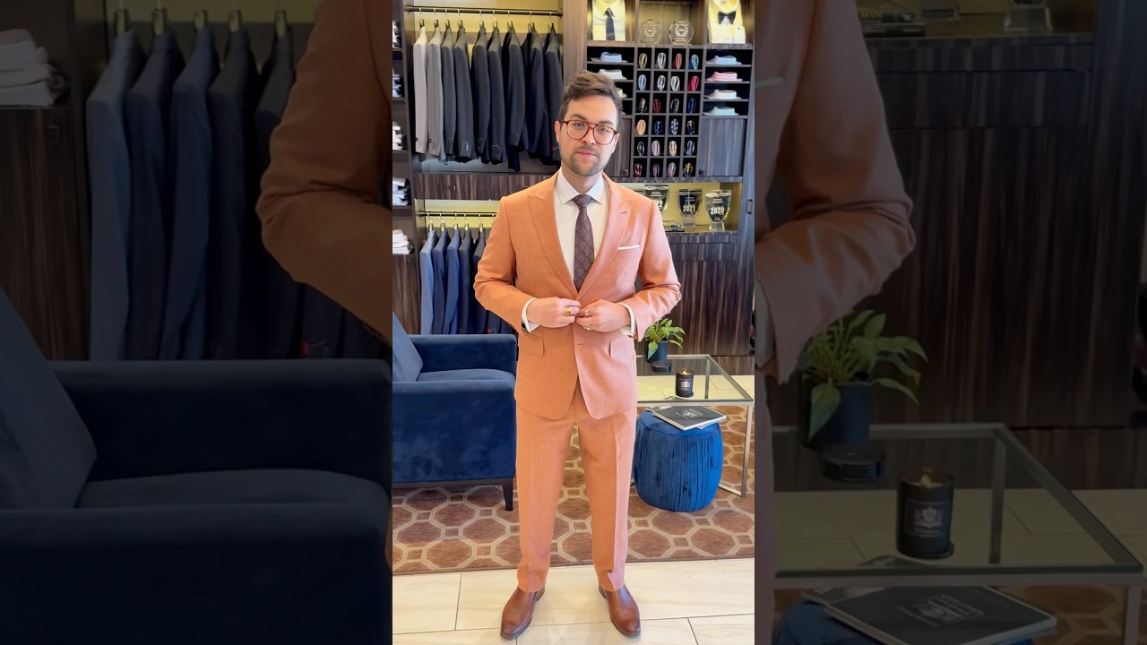 Looking sharp in his bespoke custom suit. 