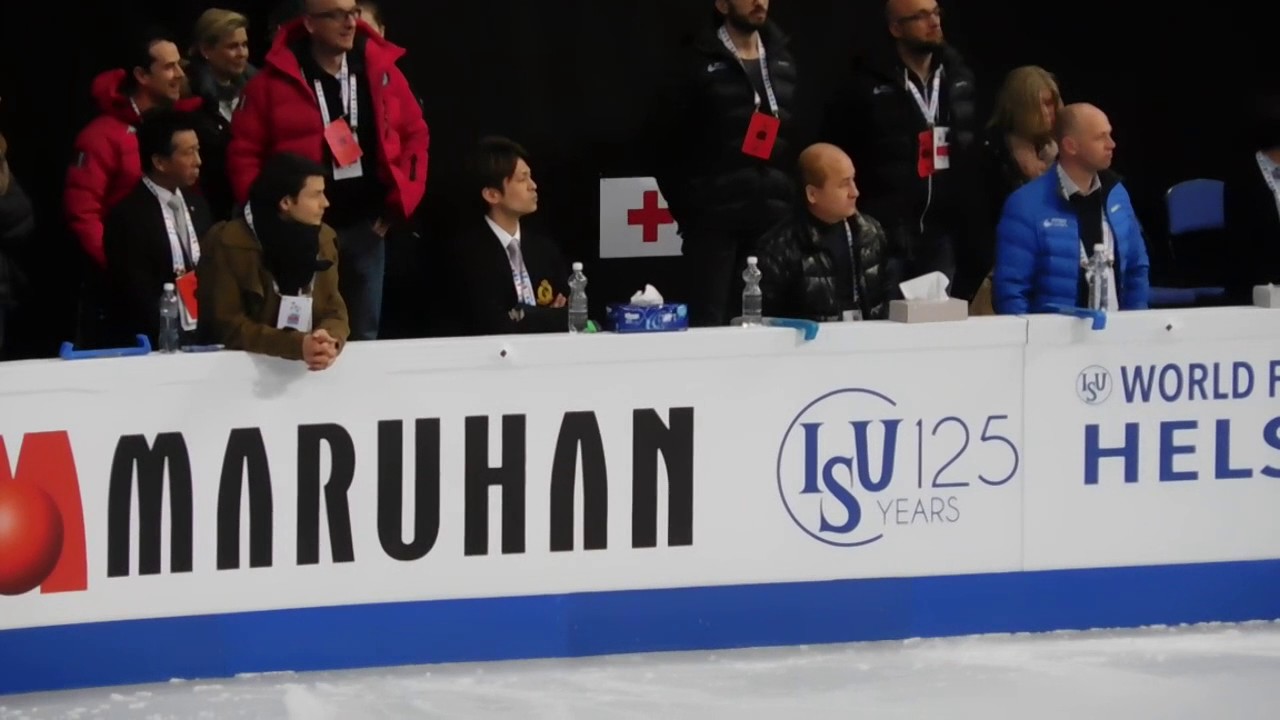 Stephane Lambiel watching Deniss Vasiljevs warming up before SP Worlds 2017