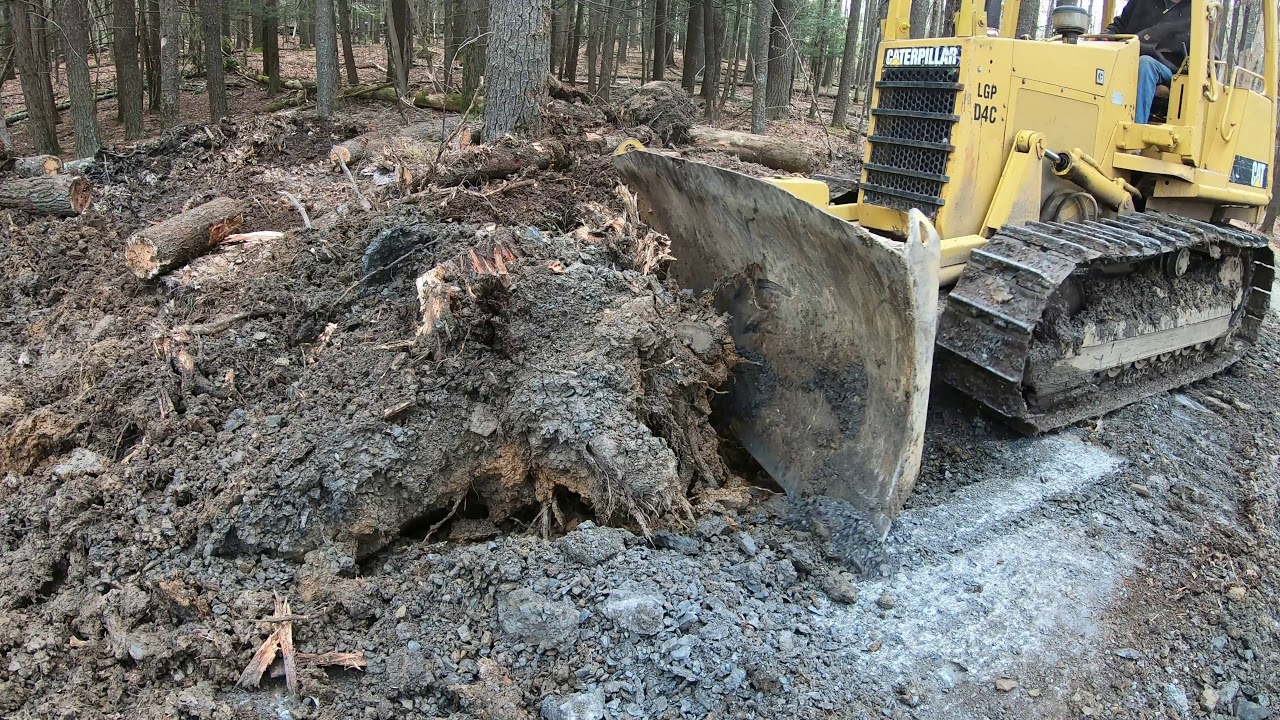 Clearing land with a dozer