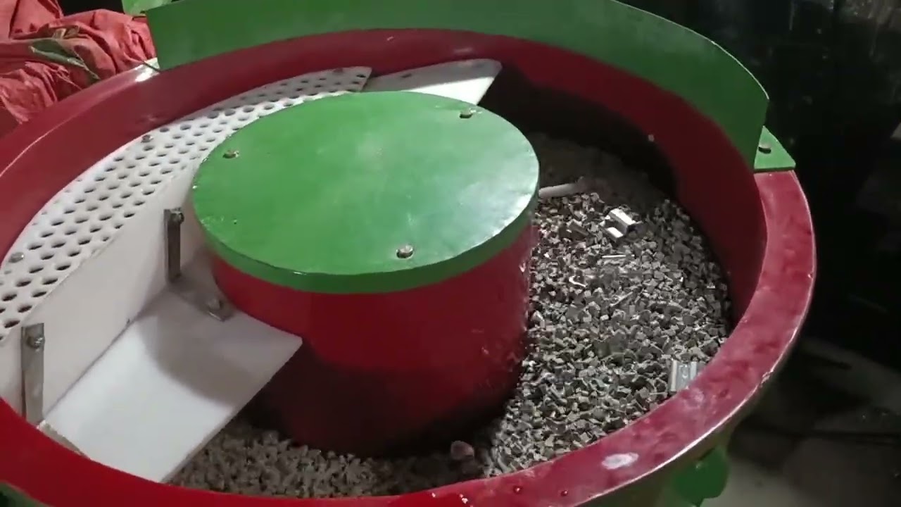 Vibratory finishing machines for deburring and finishing of aluminium exruded parts 