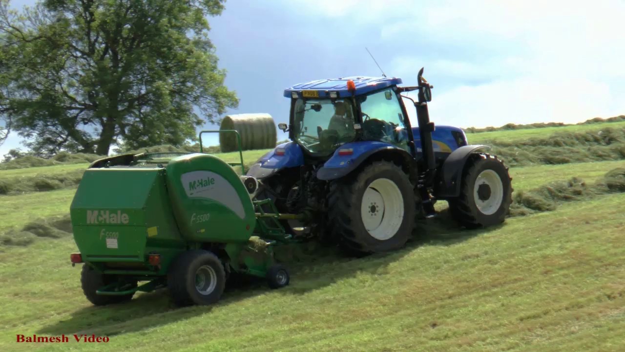 Baling the Round Bales on a Hill - Quite exciting!