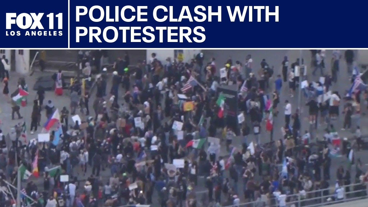 Police clash with anti-ICE protesters in downtown LA