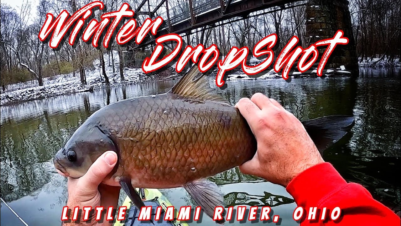 Kayak fishing in winter - Little Miami River in Ohio