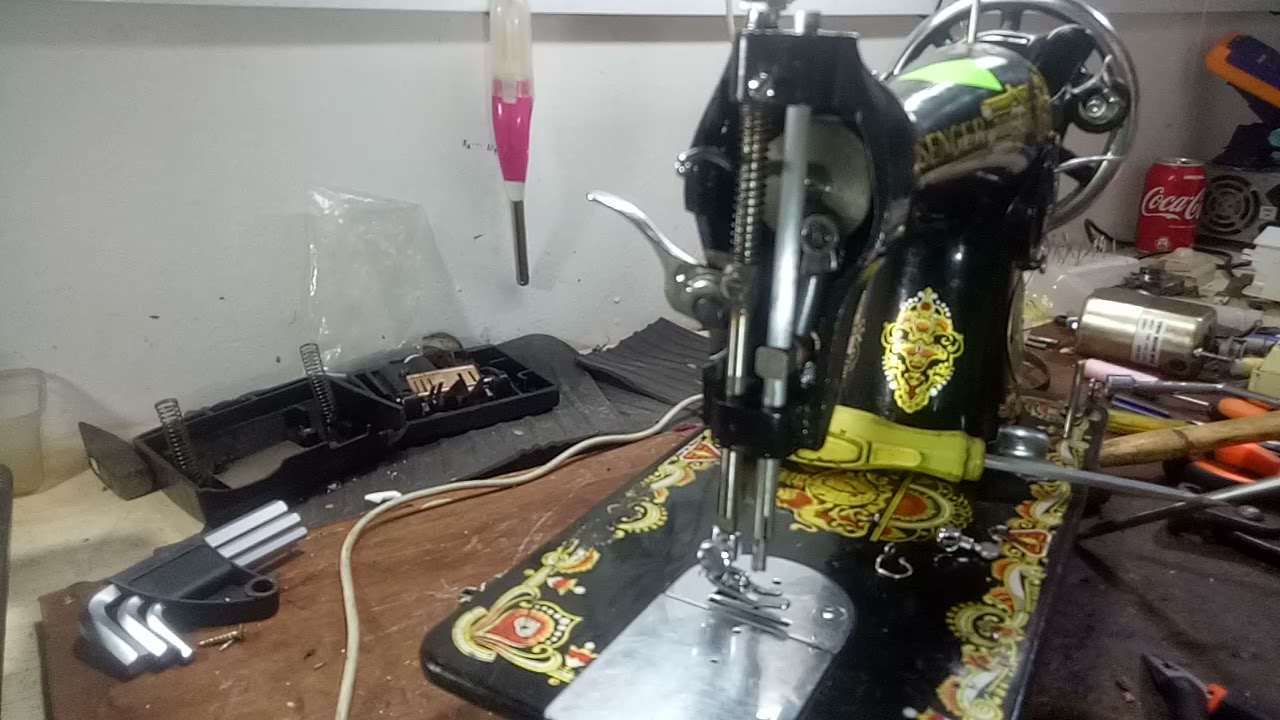 comment réparer un bar aiguille et la tension d'un machine a coudre