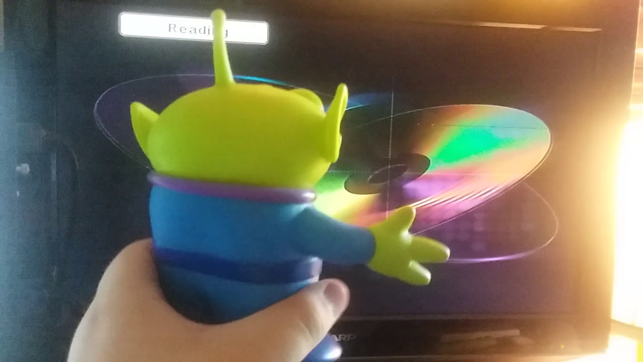Green Alien watches the Universal logo