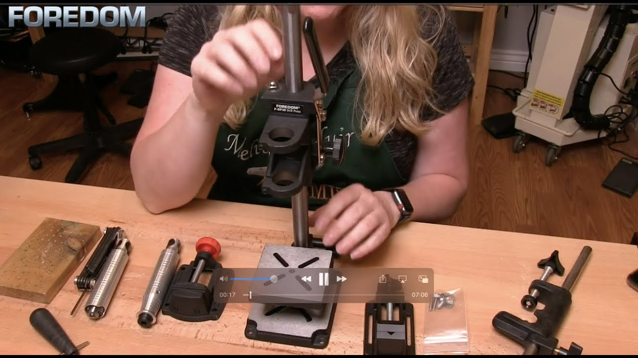 Drill press and handpiece holder