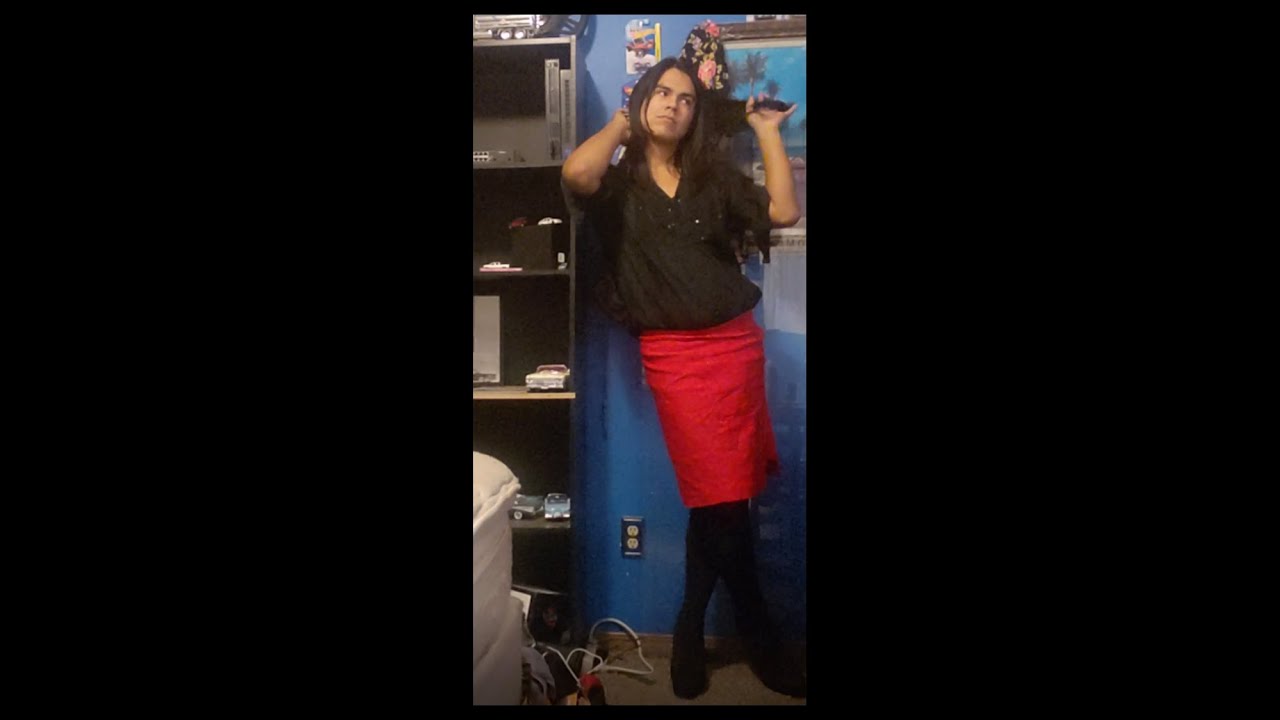 Crossdresser in high heels with a few different outfits