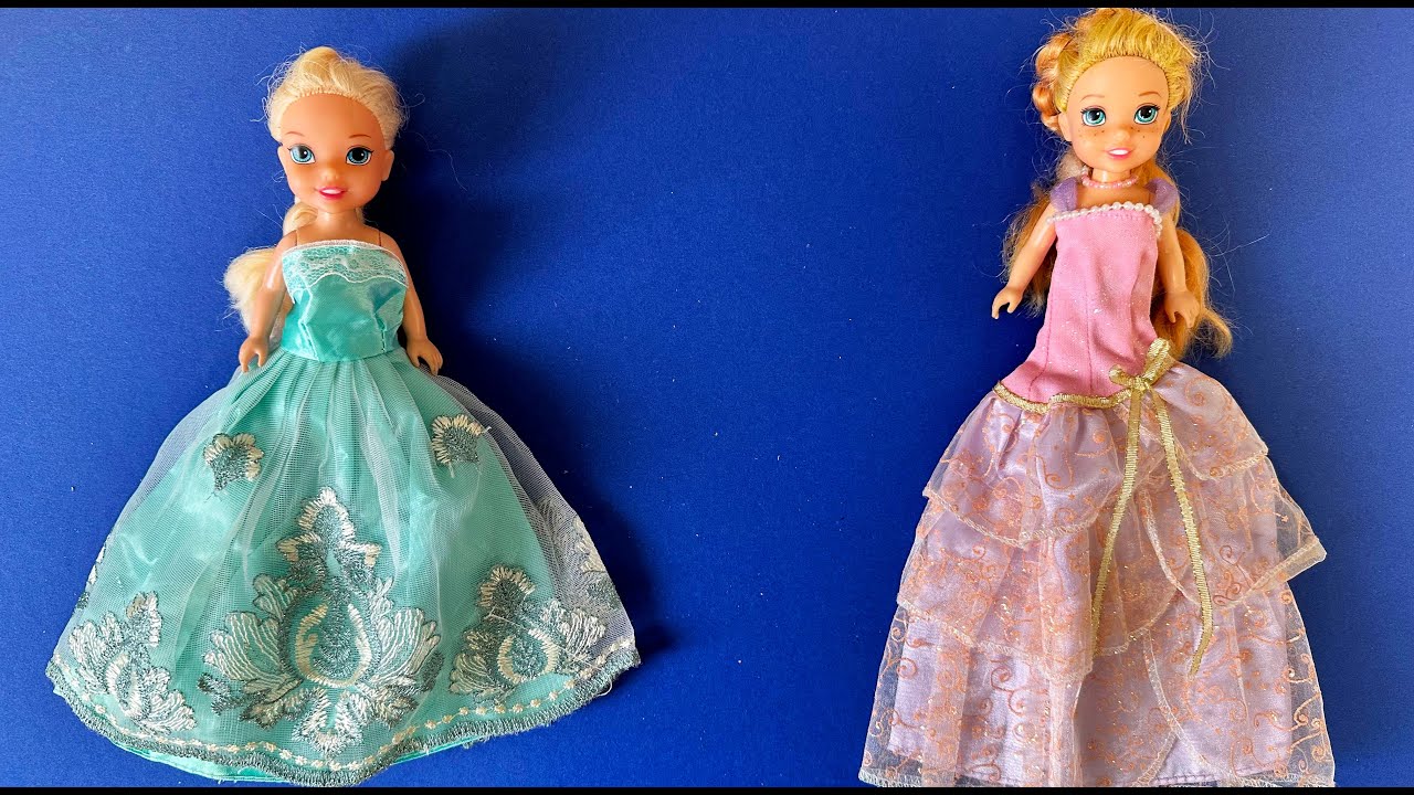 Elsa and Anna toddlers fashion game with Barbie