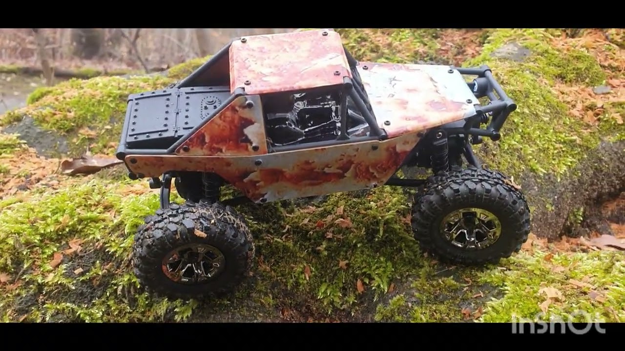 The UDIRC Snow Leopard out in the very wet and slippery woods.