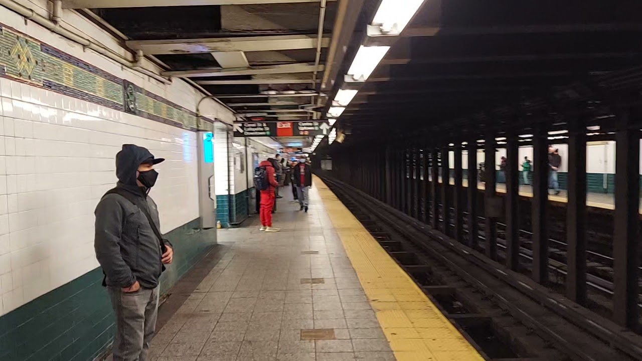 Transferring from downtown R train to downtown 6 train at Canal St Station maze