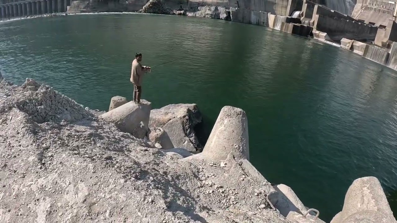 Fishing in dam site