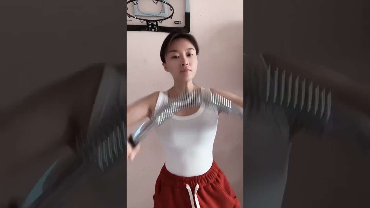 Beautiful women of china doing spring bar exercise
